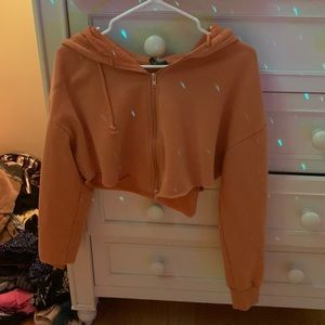 short orange zip up